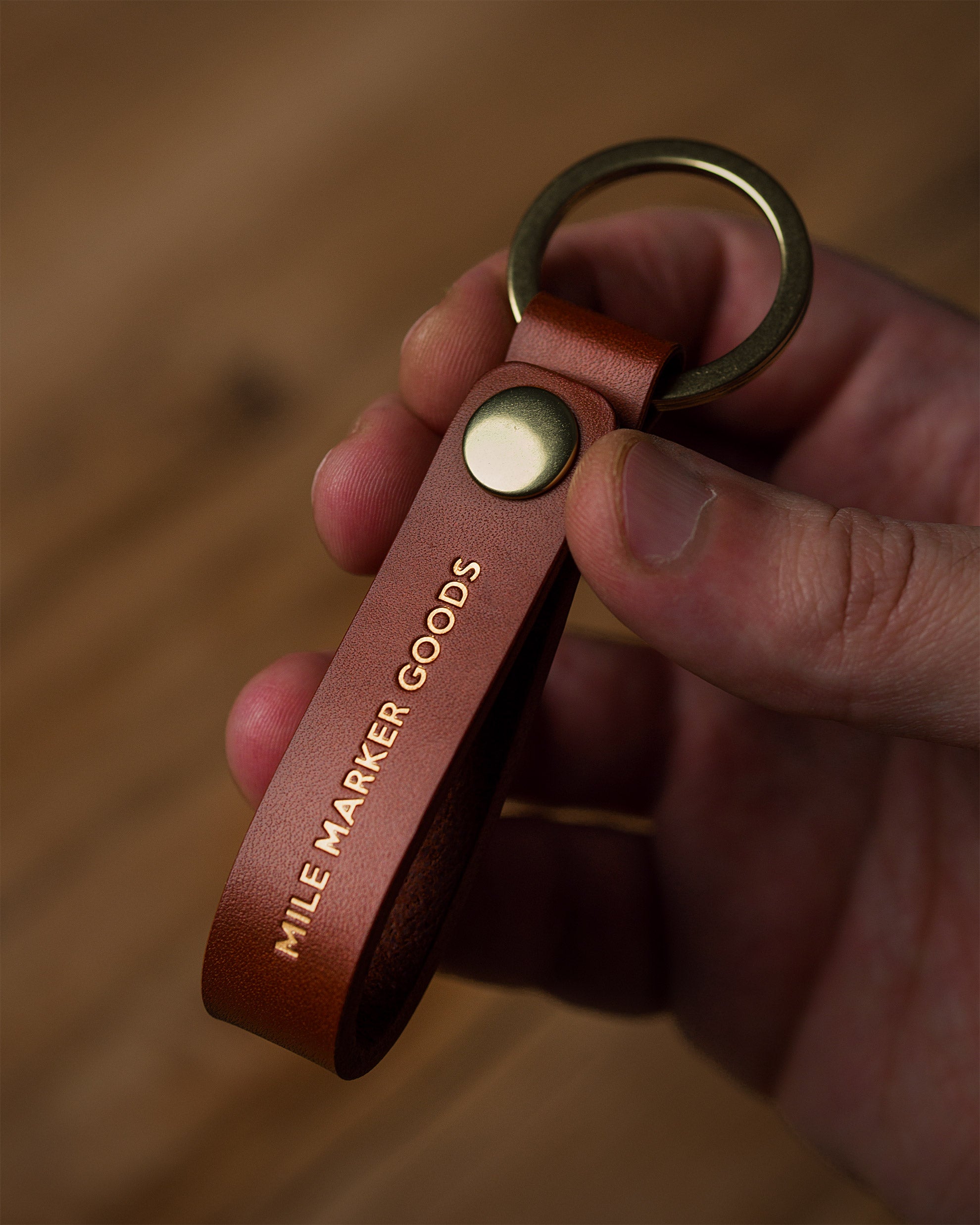 Lanyard Cognac Leather Gold Hardware In Hand
