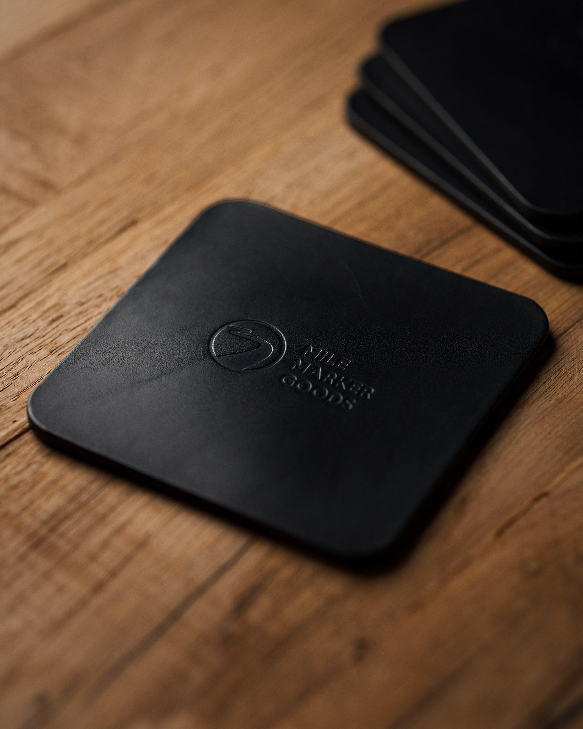 Coaster Black Single and Set in Background